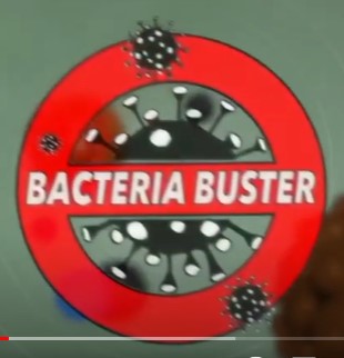 Harmaalla pohjalla iso punainen rinkula ja sen keskellä video nimi Bacteria Buster.